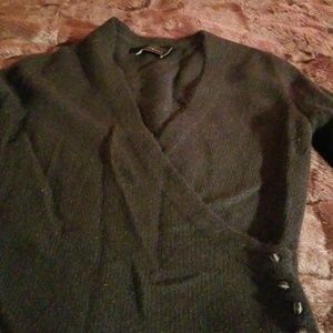 The limited black wrap sweater
